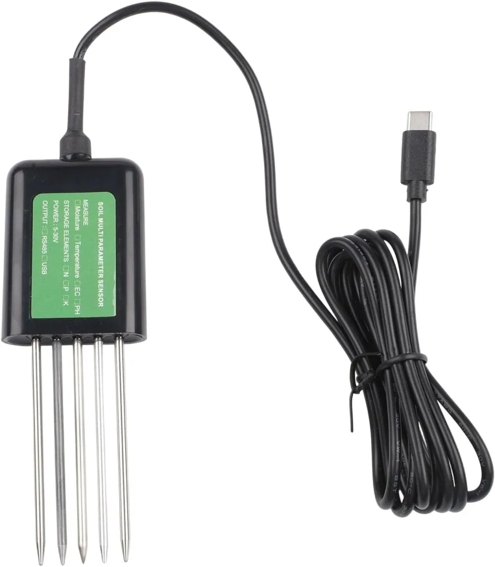Sonda de suelo USB vista de frente: cuerpo negro sellado, cinco puntas metálicas y el cable enrollado